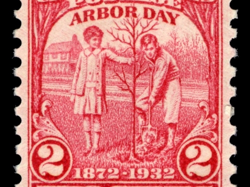 2 cent stamp with a boy and a girl planting a tree